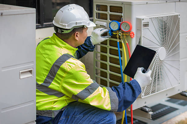 Professional Hvac technician working in Riverside, MD